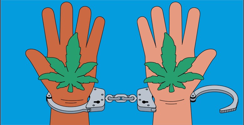 Inmate putting ballot in box