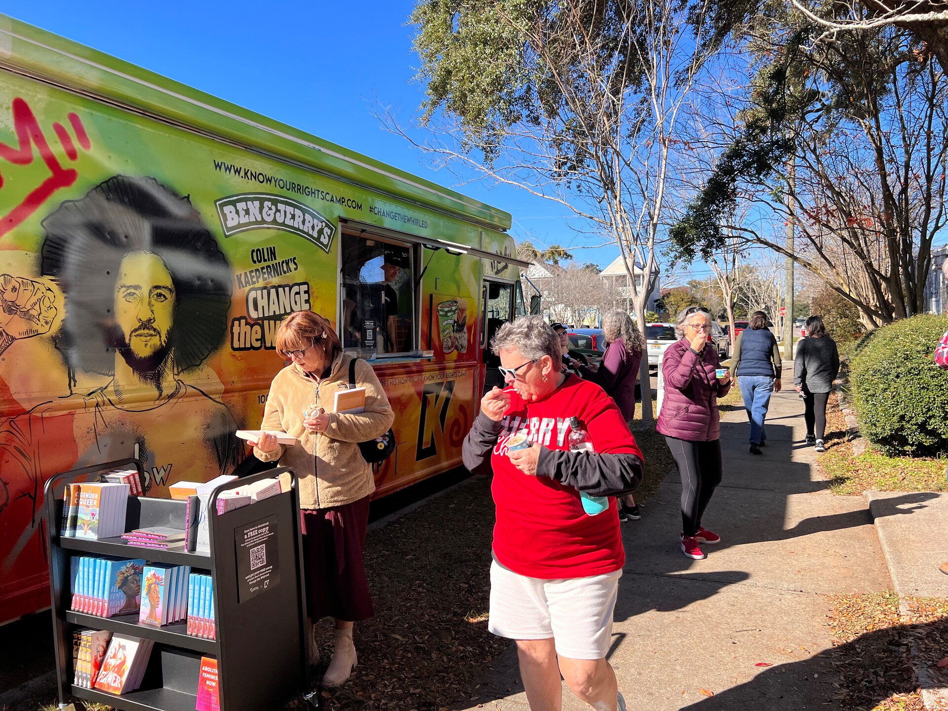 Ben & Jerry's scoop truck with a line of people