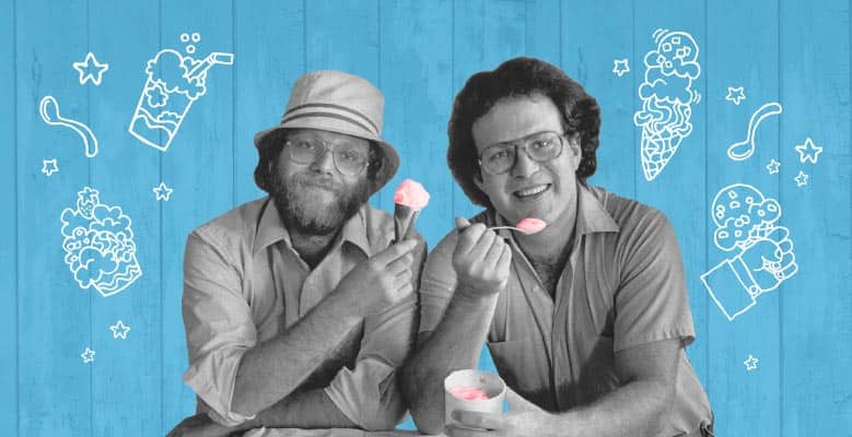 Photo of co-founders Ben and Jerry on a light blue barnboard background with illustrations of ice cream sundaes, shakes, etc. around them.