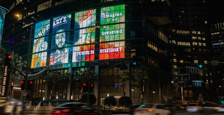 Billboard in Los Angeles that reads: Imagine if we invested in our communities?