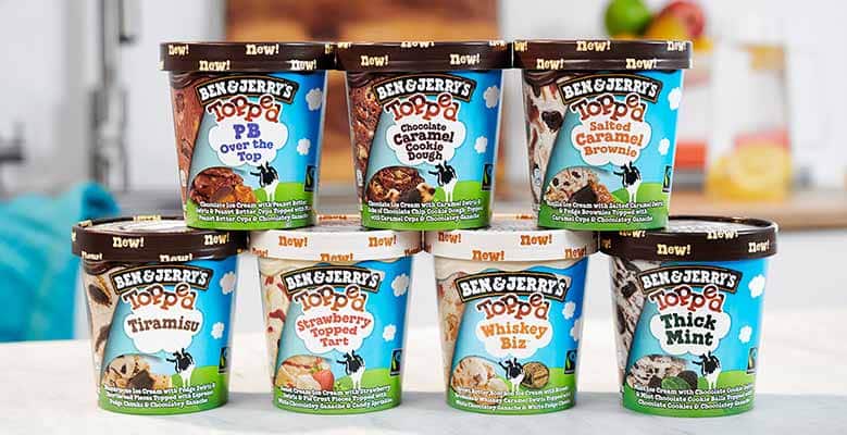 Seven pints of Ben & Jerry's Topped ice cream flavors.